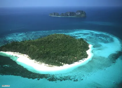 Visit Bamboo Island - Small reef-edged island